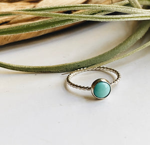 small turquoise stacker